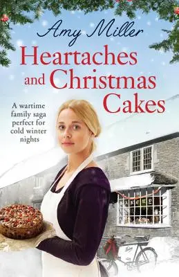 Heartaches and Christmas Cakes: Wojenna saga rodzinna idealna na mroźne zimowe wieczory - Heartaches and Christmas Cakes: A wartime family saga perfect for cold winter nights